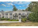 Brick building exterior, featuring multiple balconies and landscaping at 3478 Essex Ave, Atlanta, GA 30339