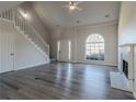 Bright living room with hardwood floors and a fireplace at 3065 Vineyard Se Way, Smyrna, GA 30082