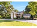Two-story house with a spacious lawn at 2100 Davis Academy Rd, Rutledge, GA 30663
