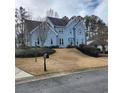 Two-story house with blue siding, landscaping, and a mailbox at 5711 Brynwood Nw Cir, Acworth, GA 30101