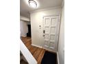 Bright entryway with hardwood floors and coat rack at 2501 Bradford Sq, Atlanta, GA 30345