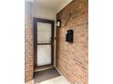 Front door entry with a mailbox and brick facade at 2501 Bradford Sq, Atlanta, GA 30345