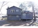 Gray sided two story home with a deck and access to the backyard at 2761 Rockdale, Decatur, GA 30034