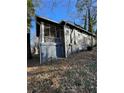 Side view of house, showing screened porch at 17 Lakeview Ne Dr, Atlanta, GA 30317