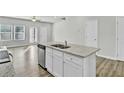Kitchen island with granite countertops and stainless steel appliances at 4336 Mallory Ct, Union City, GA 30291
