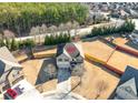 Aerial view of a two-story house, highlighting its curb appeal at 502 Starling View Cir, Grayson, GA 30017