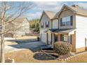 Two-story house exterior, featuring brick and siding at 502 Starling View Cir, Grayson, GA 30017