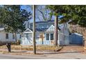 Newly renovated light blue house with front porch and yard at 1095 Mcdaniel Sw St, Atlanta, GA 30310