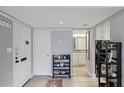 Bright and spacious entryway with storage and a view of the bathroom at 141 Maison Nw Pl, Atlanta, GA 30327