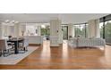 Open concept living and dining area with hardwood floors at 750 Park Ne Ave # 6E, Atlanta, GA 30326