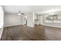 Spacious living room featuring hardwood floors and an open floor plan at 5533 N Wind Sw Dr, Lilburn, GA 30047