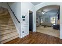 Entryway with staircase and view into living room at 4505 Ravenwood Dr, Union City, GA 30291