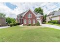 Two story house with a large front yard at 2080 Misty Oaks Dr, Buford, GA 30519