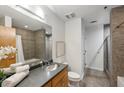 Clean bathroom with double vanity and a large shower at 640 Glen Iris Ne Dr # 303, Atlanta, GA 30308
