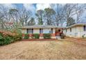 Charming ranch home with a spacious yard at 1881 Broad Ave, East Point, GA 30344