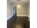 Spacious dining area with dark hardwood floors at 346 Tazor St, Atlanta, GA 30314
