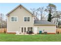 Spacious backyard featuring a patio perfect for entertaining, with a lush lawn at 3 Derrick Ave, Hampton, GA 30228