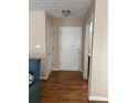 Light and bright condo entry with hardwood floors and neutral walls at 1345 Keys Crossing Ne Dr # 1345, Atlanta, GA 30319