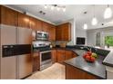 Modern kitchen with stainless steel appliances and granite counters at 400 17Th Nw St # 2213, Atlanta, GA 30363