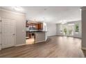 Open concept living area with kitchen and access to patio at 400 17Th Nw St # 2213, Atlanta, GA 30363