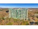 Modern high-rise building with treetop and city views at 3300 Windy Ridge Se Pkwy # 1603, Atlanta, GA 30339