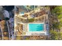 Resort-style pool with surrounding patio and lounge chairs at 3300 Windy Ridge Se Pkwy # 1603, Atlanta, GA 30339