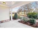 Covered porch with view of community green space at 3216 Colchester St, Douglasville, GA 30135