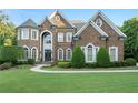 Elegant brick home with manicured landscaping at 1358 Wynbrook Trce, Smyrna, GA 30126