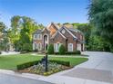 Spacious brick home with large yard and driveway at 1358 Wynbrook Trce, Smyrna, GA 30126