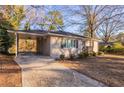 Front view of a ranch home with carport at 2196 Knoll Dr, Decatur, GA 30032