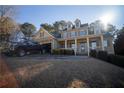 House view from the driveway with a truck parked in front at 37 Waterstone Se Dr, Cartersville, GA 30121