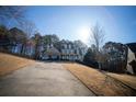 House driveway view with two cars parked in front of the home at 37 Waterstone Se Dr, Cartersville, GA 30121