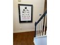 Hardwood floors and a framed print on the wall at 232 Spalding Drive Dr, Atlanta, GA 30328