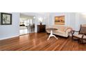 Bright living room with hardwood floors and view into the dining area at 3880 Admiral Dr, Atlanta, GA 30341