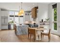 Spacious kitchen with island, stainless steel appliances, and hardwood floors at 617 East Ave, Atlanta, GA 30312