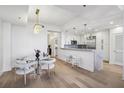 Elegant dining area with glass table and modern chairs at 2795 Peachtree Rd # 1305, Atlanta, GA 30305