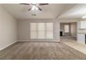 Spacious living room with neutral carpeting and a view of the fireplace at 1363 Stoneleigh Way, Stone Mountain, GA 30088