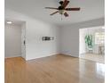 Spacious living room featuring hardwood floors and ceiling fan at 1468 Briarwood Ne Rd # 1307, Brookhaven, GA 30319