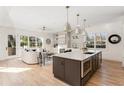 Open concept kitchen with island, quartz countertops, and stainless steel appliances at 1101 Boulevard Se Dr # B, Atlanta, GA 30317