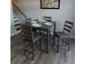 Simple gray four-person dining set in a well-lit space at 1625 Conley Rd # 138, Conley, GA 30288