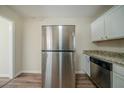 Stainless steel refrigerator in a newly remodeled kitchen at 3488 Brookfield Ln, Decatur, GA 30032