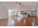 Spacious living room with hardwood floors and vaulted ceiling at 910 Callee Dr, Loganville, GA 30052