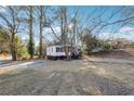 House exterior showcasing the front yard and driveway at 2178 Baker Nw Ter, Atlanta, GA 30318
