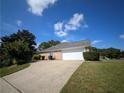 Two-car garage with a large driveway at 406 Trinkle Ct, Stockbridge, GA 30281
