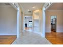 Elegant hallway with tile floors and built-in shelving at 6764 Blantyre Blvd, Stone Mountain, GA 30087