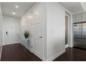 Light and airy entryway with hardwood floors and storage at 1820 Peachtree Nw St # 1005, Atlanta, GA 30309
