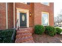 Welcoming front entrance with brick steps and landscaping at 1229 Whitlock Ridge Sw Dr, Marietta, GA 30064