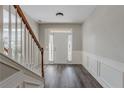 Bright entryway with wood-look flooring and staircase at 7336 Toccoa Cir, Union City, GA 30291