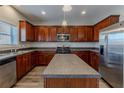 Kitchen with stainless steel appliances and an island at 7336 Toccoa Cir, Union City, GA 30291