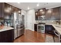 Stainless steel appliances and granite countertops in this well-lit kitchen at 1043 Belmont Commons Dr, Smyrna, GA 30080